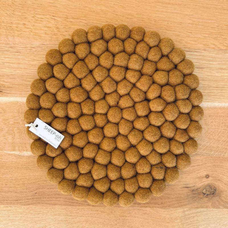 Felt Ball Pot Stand or Placemats. Handmade in Nepal using 100% NZ wool and non-toxic dyes.