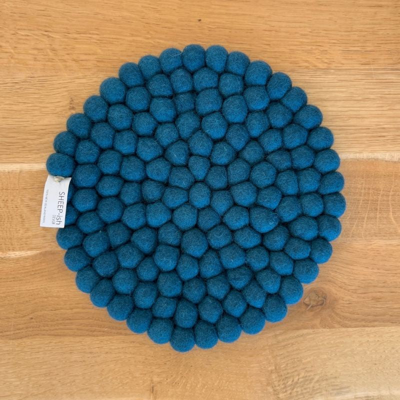 Felt Ball Pot Stand (Teal) Pot Stand or Placemats. Handmade in Nepal using 100% NZ wool and non-toxic dyes.