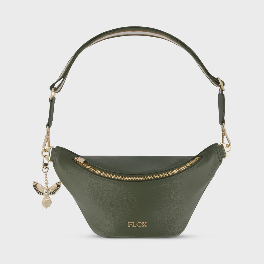 AHI Belt Bag Designed in textured vegan leather with a stunning interior satin lining featuring FLOX's distinctive artwork. This bag comes with two interchangeable straps and is inspired by the rich earthy tones of our land.