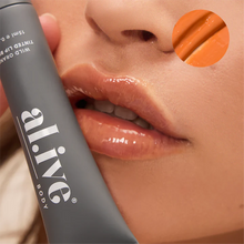 Tinted Lip Butter - Wild Orange By Al.ive A super rich, moisturising lip butter that nourishes and softens lips, while adding a wearable orange-inspired tint. Featuring wild orange leaf and botanical extracts, this buttery formula effortlessly melts into lips. Rosies Gifts, Mosgiel.