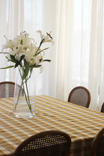 Double Check Tablecloth Yellow Sunset 140x240cm Elevate your dining ambiance with the exquisite Raine & Humble Double Weave Tablecloth. Meticulously crafted from eco-conscious recycled fabric, this tablecloth features a tastefully woven check pattern.