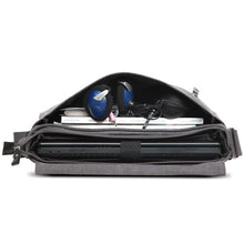 Canvas Troop shoulder bag with a visible brand logo on a white background
