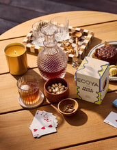 Holiday: Pear & Brandy Goldie Candle By Ecoya The fragrance equivalent of a velvet-clad holiday soirée - classy with a touch of spice. Green pear, brandy, and lime with rose and jasmine, while cedar and musk add the spicy twist
