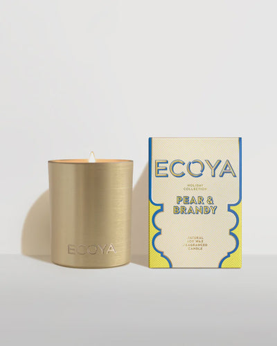Holiday: Pear & Brandy Goldie Candle By Ecoya The fragrance equivalent of a velvet-clad holiday soirée - classy with a touch of spice. Green pear, brandy, and lime with rose and jasmine, while cedar and musk add the spicy twist