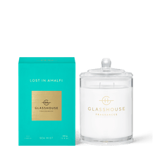 Glasshouse Fragrances Soy Candle 380g - LOST IN AMALFI SEA MIST Rosies Gifts, Mosgiel Dunedin. Impressions of crystal clear water and zesty Limoncello come from freesia, lime and moss. Top Notes: Freesia, Thyme and Tarragon  Middle Notes: Lavender and Moss Base Notes: Musk and Patchouli