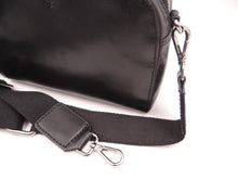 Small Cross Body Zip Closing Soft Leather Bag Adjustable Shoulder Strap with Canvas/Leather high lights Single Compartment with Zip Pocket and Open Pocket Rear External pocket Leather Zip Pulls. Rosies Gifts & Homeware, Mosgiel, Dunedin for leather bags and handbags.