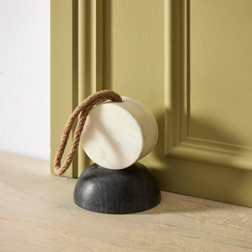 SANCTUM DOOR STOP Add a touch of elegance to your home with the Sanctum Door Stop. Crafted from white and black marble. Rosies Gifts, Mosgiel, Dunedin for your home decor needs.