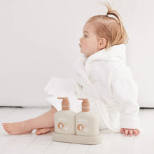 The al.ive baby Hair & Body Duo in Calming Oatmeal contains a Baby Hair & Body Wash & Body Lotion, both housed in a non-slip tray with easy-to-pump lids.