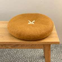 Button Cushion - 40cm 100% NZ Wool (outer) cushions with cross detail - measuring 40cm Synthetic inner filling made from recycled plastic bottles.