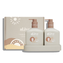 The al.ive baby Hair & Body Duo in Calming Oatmeal contains a Baby Hair & Body Wash & Body Lotion, both housed in a non-slip tray with easy-to-pump lids.