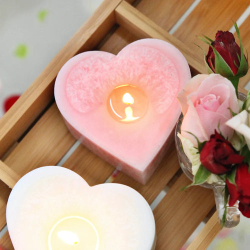 Peony Rose Heart (Blush) Candle by Living Light, made in New Zealand. Unashamedly feminine and sensual, intoxicating notes of peony, rose, peach and musk will beguile the senses and leave you wanting more. Rosies Gifts, Mosgiel, Dunedin for your candle fragrances.