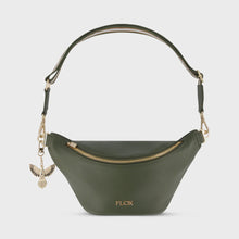 AHI Belt Bag Designed in textured vegan leather with a stunning interior satin lining featuring FLOX's distinctive artwork. This bag comes with two interchangeable straps and is inspired by the rich earthy tones of our land. 