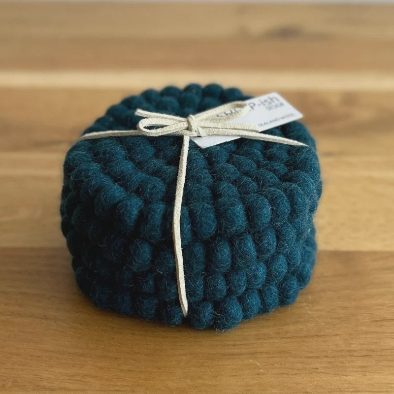 Felt Ball Set of 4 coasters. Handmade in Nepal using 100% NZ wool and non-toxic dyes. 