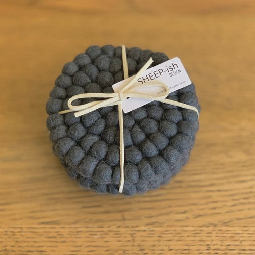 Felt Ball Set of 4 coasters. Handmade in Nepal using 100% NZ wool and non-toxic dyes. 