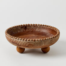 WOODLAND BOWL The Woodland Bowl is a stunning piece crafted from rich walnut-hued fir wood. Adorned with a delightful beaded design along the lip, this bowl exudes rustic charm and elegance. Rosies Gifts, Mosgiel, Dunedin for your home decor needs.