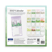 Back view of a 2027 wall calendar by Affirmations Studio, featuring a light green border, product description, a large floral monthly view, a grid of smaller monthly pages, and branding details on a white background.