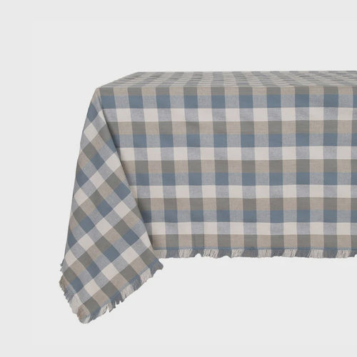 Double Check Tablecloth Blue Haze 140x240cm Elevate your dining ambiance with the exquisite Raine & Humble Double Weave Tablecloth. Meticulously crafted from eco-conscious recycled fabric, this tablecloth features a tastefully woven check pattern. 