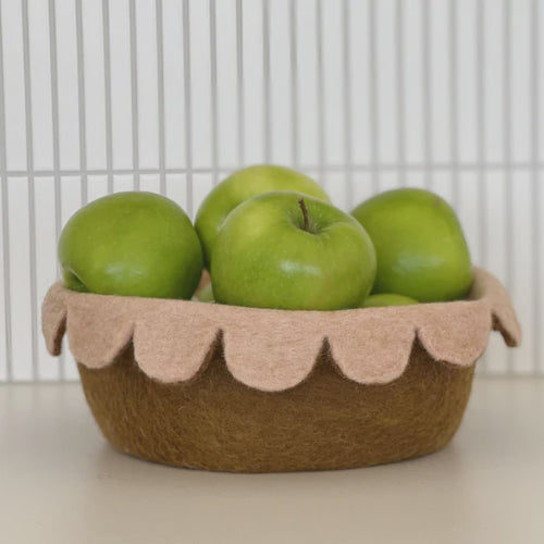 Felted Scalloped two toned bowl. Perfect as a fruit bowl or to add interest to a side board or dining setting Handmade using 100% NZ Wool in Nepal