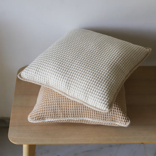 AKIIKO - PIQUE WAFFLE CUSHION COVER WITH EDGING- LATTE. THE PIQUE WAFFLE CUSHION COVER WITH EDGING IS A STYLISH AND TEXTURED ADDITION TO YOUR HOME DECOR. MADE FROM HIGH-QUALITY FABRIC. Size (LxWxH): 550x550