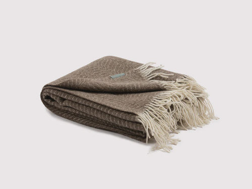 FIBRE BY AUSKIN NZ Catlin Throw Wrap yourself in luxurious warmth with this 100% New Zealand Wool woven throw, featuring a paisley pattern and fringe tassels. Rosies Gifts Mosgiel, Dunedin