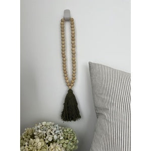 Beaded Tassel Black 55x2.5cm long This will look amazing on a wall, beautiful laid on a table or wherever you need.  Also available in Moss and White. Rosies Gifts, Mosgiel, Dunedin for your decor needs.