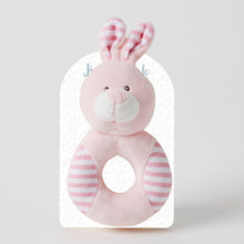 ANIMAL RATTLES 4 ASST DESIGNS These whimsical rattles are designed to captivate and entertain! Featuring four charming designs and colours – an adorable elephant, a lovable bunny, a friendly dog, and a cuddly bear. Rosies Gifts for baby, children's clothing and gifts.