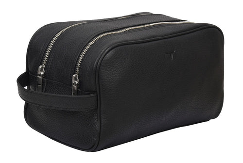 Black leather toiletry bag with silver zippers on a white background