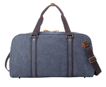 Canvas duffel bag with brown straps and a visible brand logo on a white background