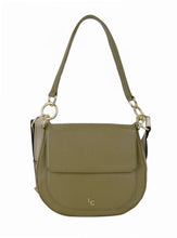 Green handbag with a strap on a white background