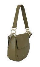 Green leather handbag with a strap on a white background