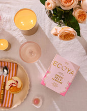 Sweet Pea & Jasmine Grand Goldie Candle by Ecoya. A floral and elegant fragrance featuring sweet pea with notes of watermelon, cucumber and white jasmine. Introducing the Grand Goldie Candle, a magnificent statement piece in our Holiday Collection. 