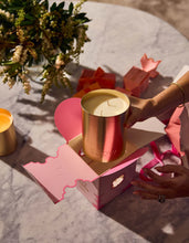 Sweet Pea & Jasmine Grand Goldie Candle by Ecoya. A floral and elegant fragrance featuring sweet pea with notes of watermelon, cucumber and white jasmine. Introducing the Grand Goldie Candle, a magnificent statement piece in our Holiday Collection. 