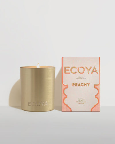 Holiday: Peachy Goldie Candle By Ecoya A peachy sun-kissed paradise. Juicy peach, summer berries and tropical pineapple with hints of orange blossom and a touch of gardenia. It’s a peach beach party and everyone is invited. 