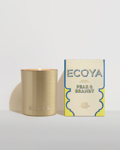 Holiday: Pear & Brandy Goldie Candle By Ecoya The fragrance equivalent of a velvet-clad holiday soirée - classy with a touch of spice. Green pear, brandy, and lime with rose and jasmine, while cedar and musk add the spicy twist 