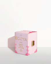 Sweet Pea & Jasmine Grand Goldie Candle by Ecoya. A floral and elegant fragrance featuring sweet pea with notes of watermelon, cucumber and white jasmine. Introducing the Grand Goldie Candle, a magnificent statement piece in our Holiday Collection. 