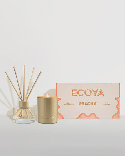 Holiday: Peachy Mini Gift Set By Ecoya A peachy sun-kissed paradise. Juicy peach, summer berries and tropical pineapple with hints of orange blossom and a touch of gardenia. Set includes 50mL Reed Diffuser and 105g Soy Wax Candle Made in New Zealand