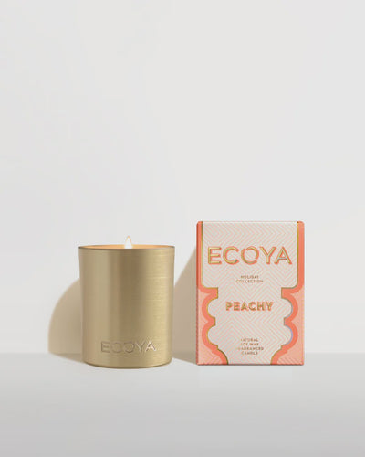 Holiday: Peachy Mini Goldie Candle by Ecoya A peachy sun-kissed paradise. Juicy peach, summer berries and tropical pineapple with hints of orange blossom and a touch of gardenia. It’s a peach beach party and everyone is invited. 