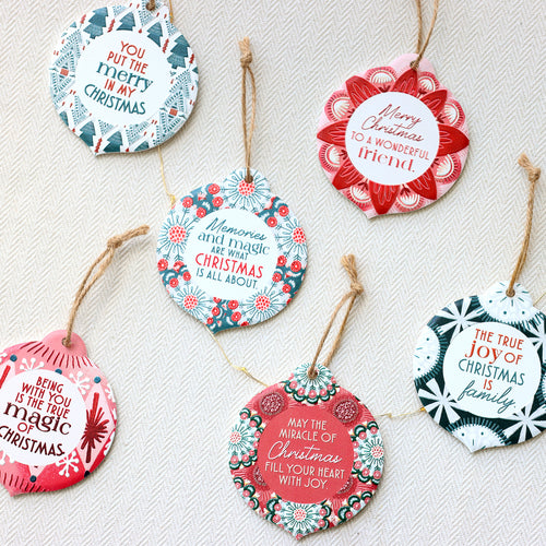 Christmas Ceramic Decorations Range Details: Made from high-quality ceramic! Includes a ribbon for hanging on your Christmas tree! Bauble-shaped design! 