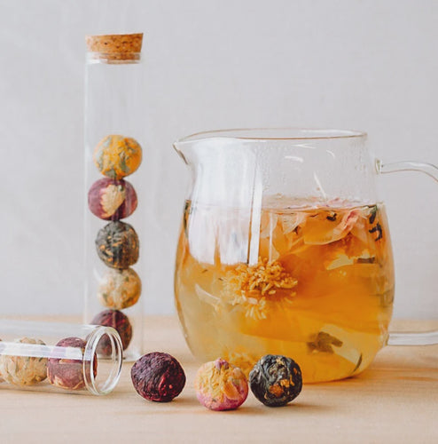 Blooming Tea Balls in Glass Tube by Better Tea Co Experience a sensory delight with our blooming herbal tea balls in glass test tube. Rosies Gifts, Mosgiel, Dunedin