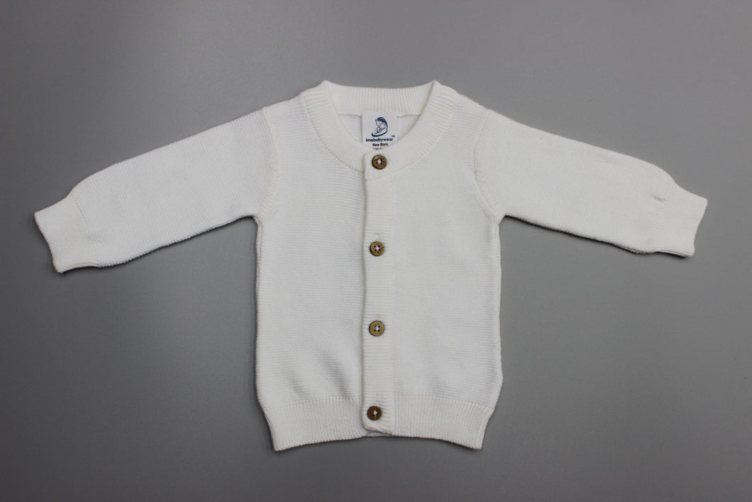 Classic White Cotton Cardigan for all seasons. Beautiful gift for that newborn or a birthday. Made with 100% Cotton ,Machine Washable. Ideal baby clothing, infant clothing for that special little one. Rosies Gifts & Homeware, Mosgiel, Dunedin.