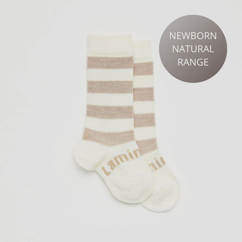 Lamington socks Dandelion - Knee high merino socks. An essential item for every new baby. Merino wool is super soft and cosy on a baby’s delicate skin. The Newborn Naturals range comes in our three smallest sizes. New Zealand Made, 70% Merino wool.  Rosies Gifts & Homeware, Mosgiel, Dunedin